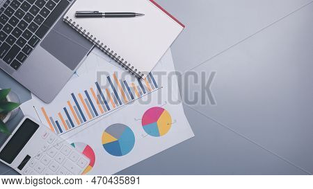 Calculators, Laptops And Notebooks Are Placed On The Table,

Concept Of Calculating Company Financia