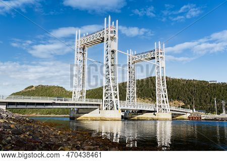 The Sir Ambrose Shea Lift Bridge Standing Tall Over A Body Of Water Along The East Coast Of Canada A