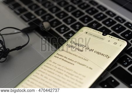 Screen With Chatgpt Chat With Ai Or Artificial Intelligence. Man Search For Information Using Artifi
