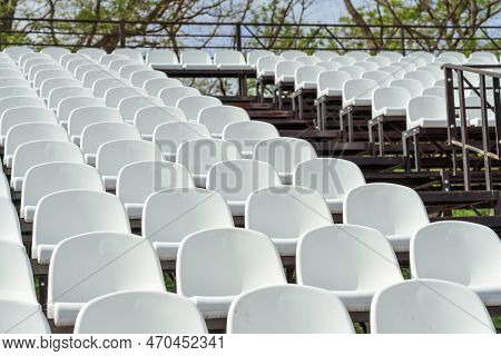 Seats Of Tribune On Sport Stadium. Concept Of Fans, Chairs For Audience, Cultural Environment Concep