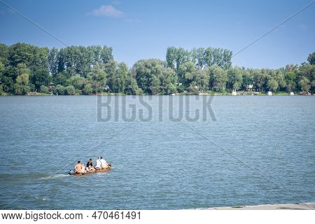 Belgrade, Serbia - August 19, 2017:danube River In Serbia, In Zemun, In Belgrade, With A Small Boat 