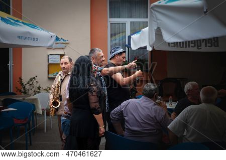 Baile Herculane, Romania - September 15, 2022: Selective Blur On A Romanian Music Band Playing In A 