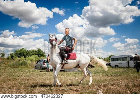 Ruma, Serbia - June 26, 2022: Selective Blur On A Horserider, Serbian Young Man, Riding And Taming A