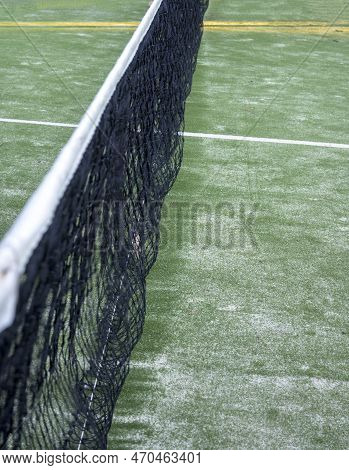 Net On Paddle Court With Green Artificial Grass And Sand Vertically With Copy Space