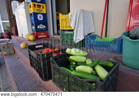 Paleochora, August 6, 2022: Different Vegetables In Plastic Boxes For Sale Near Small Market In Pale