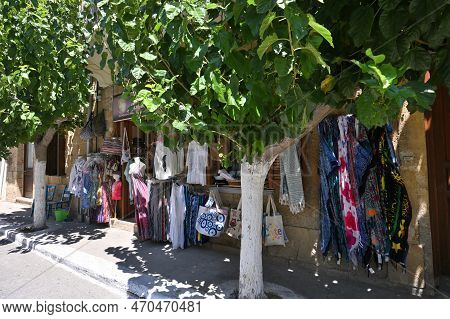 Paleochora, August 6, 2022: Colorful Clothes And Materials At Souvenir Store In Paleochora Town, Cre