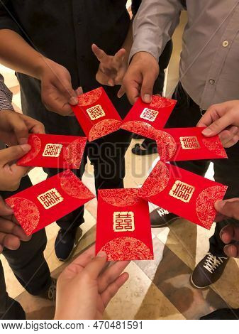 Photo Of People Gather Wedding Gift Envelope At Chinese Wedding For Their Friends And Family.
