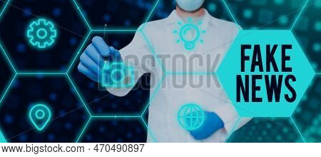 Conceptual Caption Fake News. Word Written On Giving Information To People That Is Not True By The M