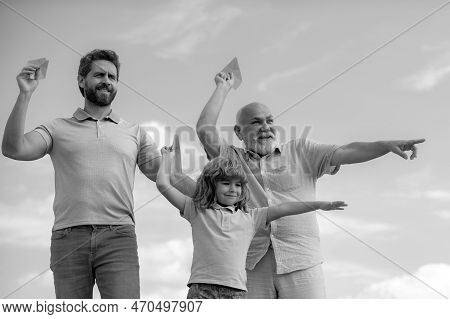 Fathers Day. Kid Having Fun With Toy Plane. Men Generation Family With Three Different Generations A