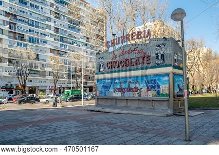 Madrid, Spain - December 27, 2021: Kiosk Of A Churro Shop (churreria) In Barrio Del Pilar, A Neighbo