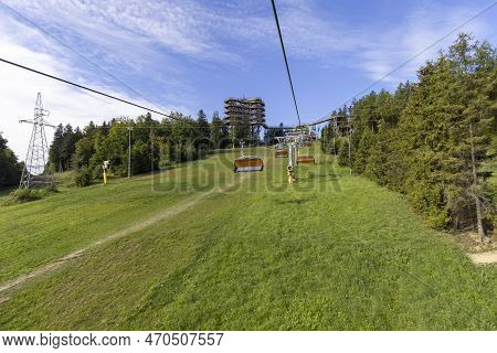 View Of Chairlift To The Mountain With Observation Tower Located At The Top Of The Słotwiny Arena Sk