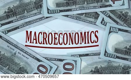 Macroeconomics - Word On The Background Of Cash Dollar Bills.basic Concepts Of Finance.business Them