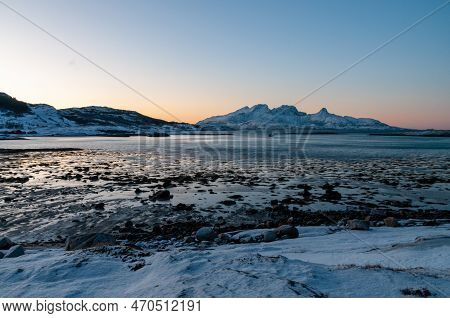 Wide Angle Landscape Shot Of The Snow Covered Mountains And Beach Near Mjelle, Part Of The Bodo Comm