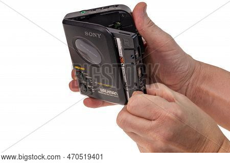 Close-up View Of Male Hand Inserting Audio Cassette Tdk Into Sony Walkman Cassette Recorder. Sweden.