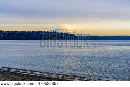 Clouds Cover Mount Rainier Across The Puget Soud In Washington State.