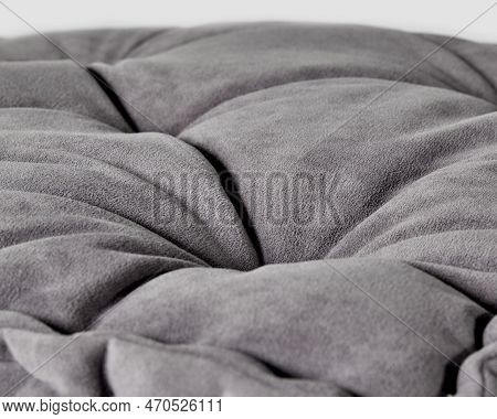 Soft Gray Velour Surface Of Seat Cushion For Cozy Interior