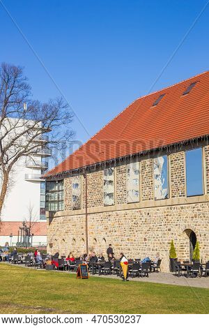 Magdeburg, Germany - March 20, 2022: People Eating And Drinking At A Cafe In The Monastery Of Magdeb