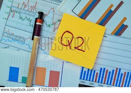 Concept Of Q2 - 2nd Quarter Period Write On Sticky Notes Isolated On Wooden Table.