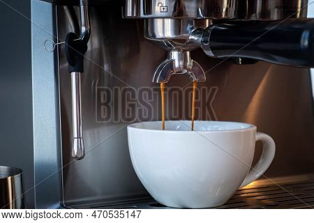 The Beautiful Caremel-colored Flow Of A Healthy Espresso Exctraction.
