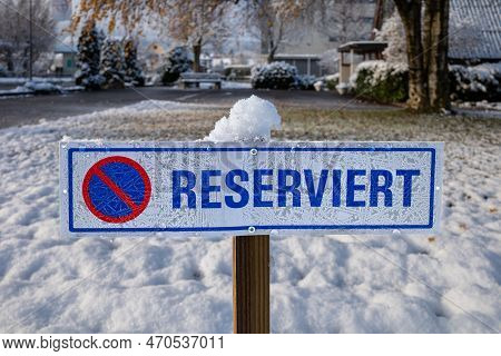 Birr, France - December 12, 2022: A German Sign In The Parking Lot Indicating The Reservation Of A P