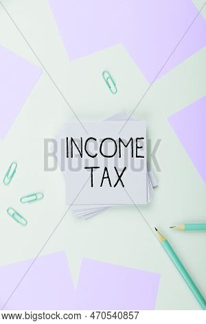 Writing Displaying Text Income Tax. Business Showcase Annual Charge Levied On Both Earned And Unearn