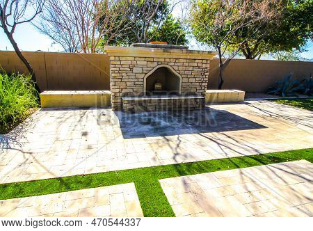 Large Stone Raised Hearth Fireplace In Back Yard