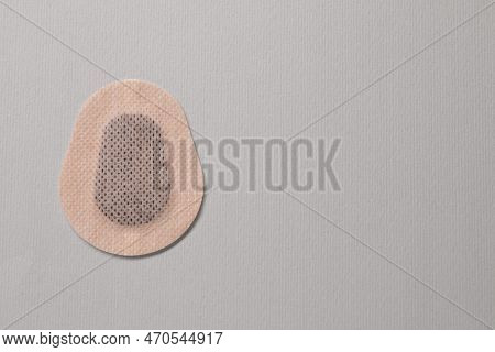Contraceptive Patch On Light Grey Background, Top View. Space For Text