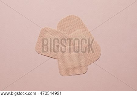 Contraceptive Patches On Pink Background, Flat Lay