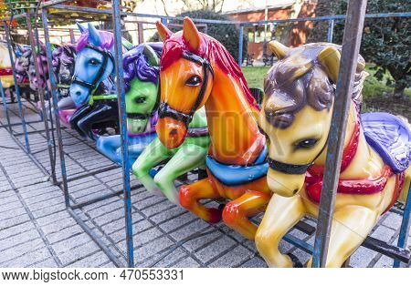 Horses Out Of Merry-go-round Placed On Line. Outdoors Shoot