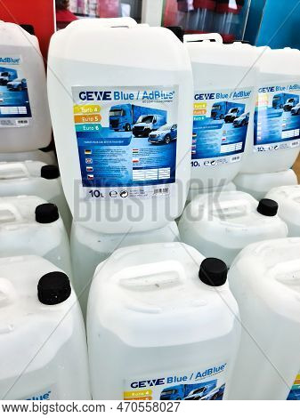 Kiel, Germany - 11 February 2023: A Stack Of Canisters Of The Additive Adblue In A Market