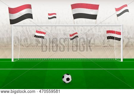 Yemen Football Team Fans With Flags Of Yemen Cheering On Stadium, Penalty Kick Concept In A Soccer M