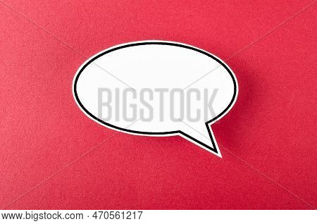 Speech Bubble With Copy Space Communication Talking Speaking Concepts On Red Background.