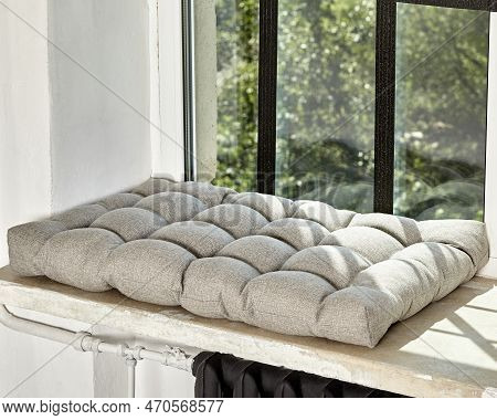 Soft Scandinavian Style Gray Cushion Lying On Windowsill