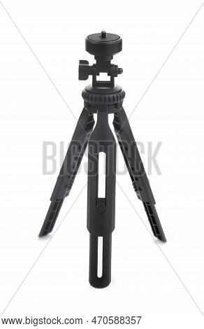 Portable Tripod For Mobile Phone Or Small Camera Isolated On A White Background.