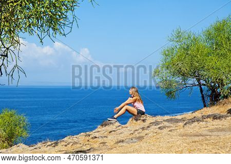 Happy Woman Walking On Summer Sea Beach Holiday. Beautiful Girl Relaxing On High Ocean Cliff. Lookin