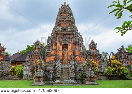Details Of Traditional Balinese Hindu Temple. Entrance Gate With Door, Stone Carving, Bhoma Sprit Fa