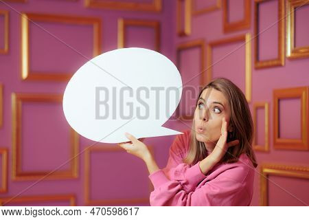 Woman Holding A Speech Bubble Having A Secret To Tell