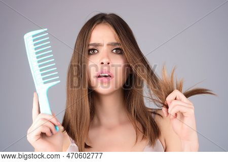 Hair Loss Woman With A Comb And Problem Hair. Hairloss And Hairs Problems. Sad Girl With Damaged Hai