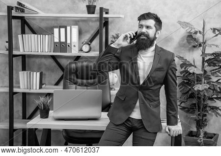 Reimagined Mobile Experience. Happy Man Talk On Phone In Office. Mobile Communication