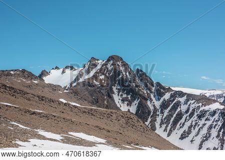 Scenic Alpine Landscape With Snowy Mountain With Peaked Top In Center. Wonderful View To Pointed Pea