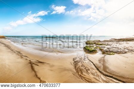 Fabulous Seascape With Pure Sand And Rocky Cliffs, Sea Bay, Islets And Faraglioni Near By Frassanito