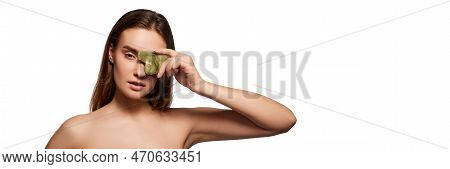 Young Beautiful Girl Posing With Body And Massage Tool - Gua Sha Over White Studio Background. Cercu