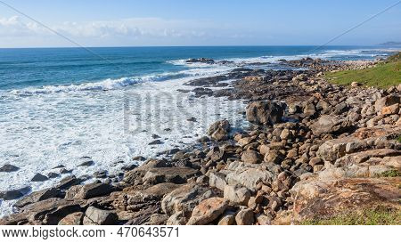 Scenic Rocky Coastline With Ocean Sea Waves Breaking Crashing Overlooking Scenic Beach Holiday Lands