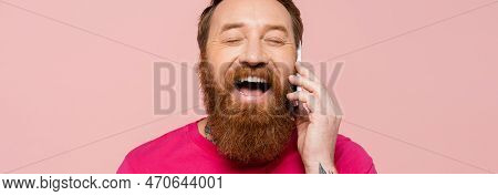 Laughing Bearded Man With Closed Eyes Talking On Smartphone Isolated On Pink, Banner.