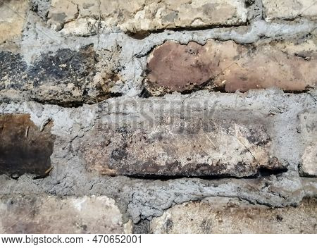 Brick Wall. Rough Brickwork. An Ineptly Built Brick Wall.