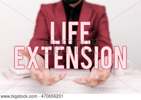 Hand Writing Sign Life Extension. Internet Concept Able To Continue Working For Longer Than Others O