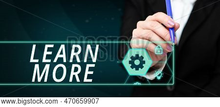 Hand Writing Sign Learn More. Business Overview Deepen Knowledge Of The Thing You Want To Do Or New 