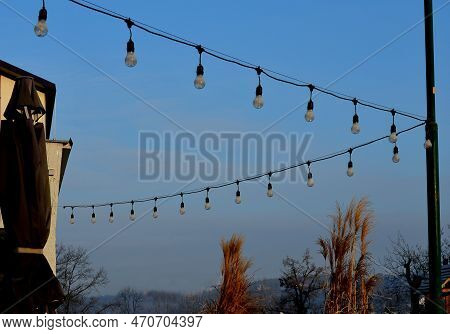 The Decoration Of The Celebration Is Not Possible Without A Lot Of Lights On The Chain. Wedding With
