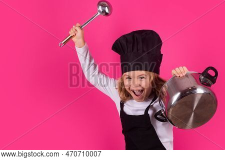 Fynny Kid Chef Cook With Cooking Pot And Ladle. Child Chef Cook. Child Wearing Cooker Uniform And Ch