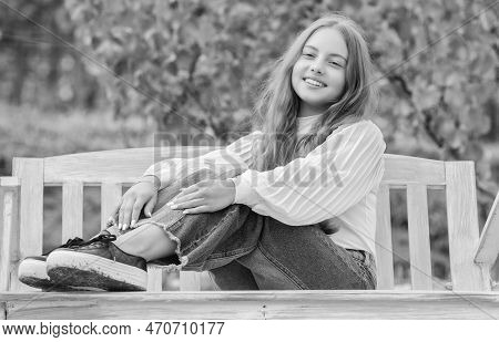Teen Girl Having Fun On Playground. Childhood Happiness. Relax In Park. Summertime Activity.
